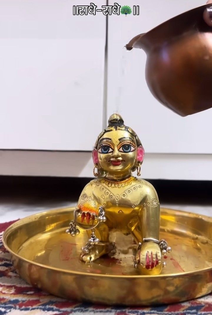 Ladoo Gopal snann ( bathing )